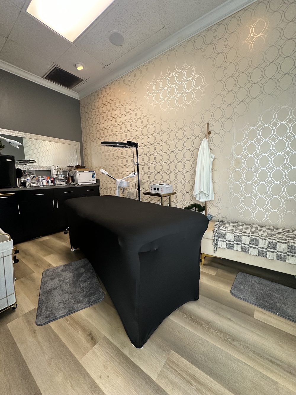 Private room with treatment bed and lash light